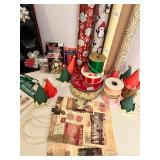 Collection of Holiday Gift Wrapping Supplies Including Wrapping Paper, Gift Bags, and Accessories