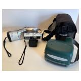 Collection of Vintage and Digital Cameras with Polaroid Accessories