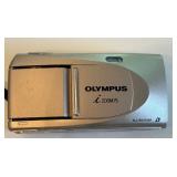 Collection of Vintage and Digital Cameras with Polaroid Accessories