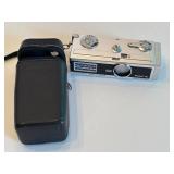Collection of Vintage and Digital Cameras with Polaroid Accessories