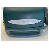 Collection of Vintage and Digital Cameras with Polaroid Accessories