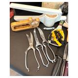 Assorted Kitchen Utensils and Tools Featuring Knife Sharpener and Decorative Stencils