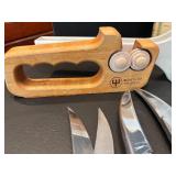 Assorted Kitchen Utensils and Tools Featuring Knife Sharpener and Decorative Stencils