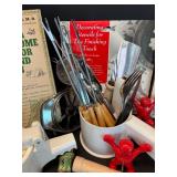 Assorted Kitchen Utensils and Tools Featuring Knife Sharpener and Decorative Stencils