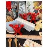 Assorted Kitchen Utensils and Tools Featuring Knife Sharpener and Decorative Stencils