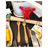 Assorted Kitchen Utensils and Tools Featuring Knife Sharpener and Decorative Stencils