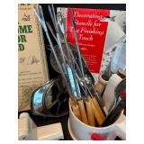 Assorted Kitchen Utensils and Tools Featuring Knife Sharpener and Decorative Stencils