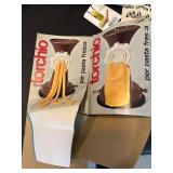 Assorted Kitchen Utensils and Tools Featuring Knife Sharpener and Decorative Stencils