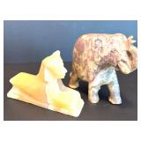 Two Decorative Stone Figurines: Egyptian Sphinx and Elephant