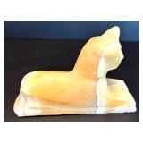 Two Decorative Stone Figurines: Egyptian Sphinx and Elephant