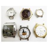 Group of 6  Silver Tone Base Metal Quartz Analog watches. Need Bands.. New Battery Installed!