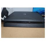 Sony PlayStation 4 with Game and Controller