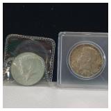 2 KENNEDY HALF DOLLARS  ONE FROM 1964, THE OTHER FROM 1965