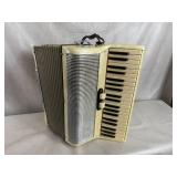 Silvertone Accordion w/ Case and Books