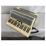 Silvertone Accordion w/ Case and Books