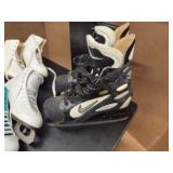 Three Pair of Gently Used Ice Skates: 1 pair Hockey Skates (Size 9), 2 Pairs Figure Skates Size (Size 6). All are in Great Condition!