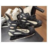 Three Pair of Gently Used Ice Skates: 1 pair Hockey Skates (Size 9), 2 Pairs Figure Skates Size (Size 6). All are in Great Condition!