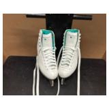 Three Pair of Gently Used Ice Skates: 1 pair Hockey Skates (Size 9), 2 Pairs Figure Skates Size (Size 6). All are in Great Condition!