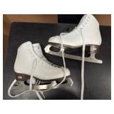 Three Pair of Gently Used Ice Skates: 1 pair Hockey Skates (Size 9), 2 Pairs Figure Skates Size (Size 6). All are in Great Condition!