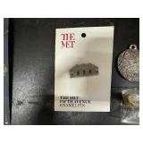 Necklaces in original packaging and Collector Pins