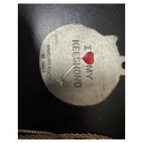 Necklaces in original packaging and Collector Pins