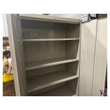 Two Door Metal Cabinet. 36" x 18" x 78". Five Shelves. In Very Good Condition.