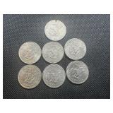 7 Susan B Anthony $1 coins 1 holed