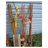 Electric fence: bundles of posts, r...