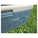 Three coolers, three folding chairs...