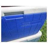 Three coolers, three folding chairs...