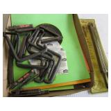 Climbing spikes, bow hanger in pack...