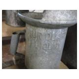 Vintage oil & water cans...