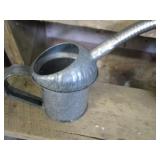 Vintage oil & water cans...