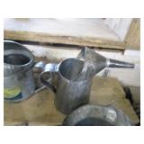 Vintage oil & water cans...