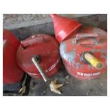Fuel cans, two metal, two plastic...