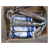 Three grease guns, couple tubes of ...