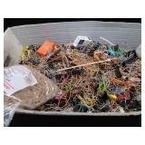 BIN OF RUBBER BANDS AND PAPERCLIPS