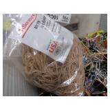 BIN OF RUBBER BANDS AND PAPERCLIPS