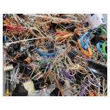 BIN OF RUBBER BANDS AND PAPERCLIPS