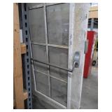 A SET OF TWO HEAVY DUTY STEEL AND GLASS METAL SAFETY DOORS