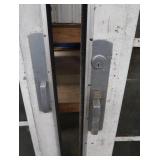 A SET OF TWO HEAVY DUTY STEEL AND GLASS METAL SAFETY DOORS