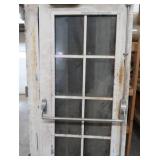 A SET OF TWO HEAVY DUTY STEEL AND GLASS METAL SAFETY DOORS