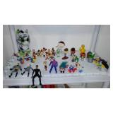 Assorted Action Figurines. Disney, Smurfs, Sesame Street, Toy Story.