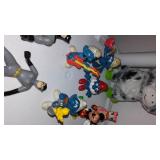 Assorted Action Figurines. Disney, Smurfs, Sesame Street, Toy Story.