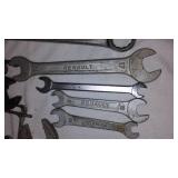 Assorted hand tools. Wrenches, hammer, tape measure and more.