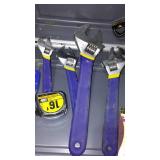 Assorted hand tools. Wrenches, hammer, tape measure and more.