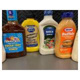 NE 1 - Collection of Assorted Condiments Including Aioli, Mayo, and Dressing