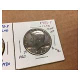 (2) 1980 Kennedy Half Dollars Stamped - 1960 & 1980