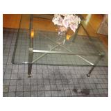 Metal framed glass top coffee table...