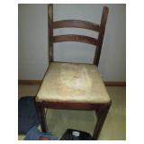 Vintage chair with misc clothing an...
